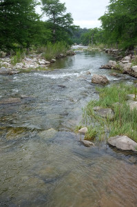The river slows downstream of Pedernales Falls